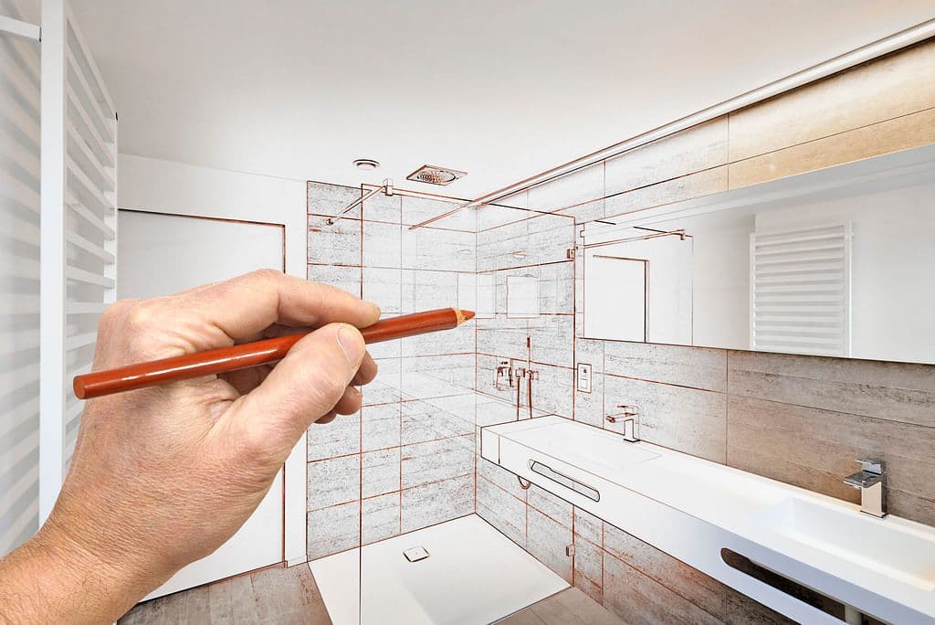 Person sketching bathroom